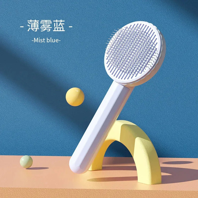 Blue-white self-cleaning pet slicker brush displayed on a plain background