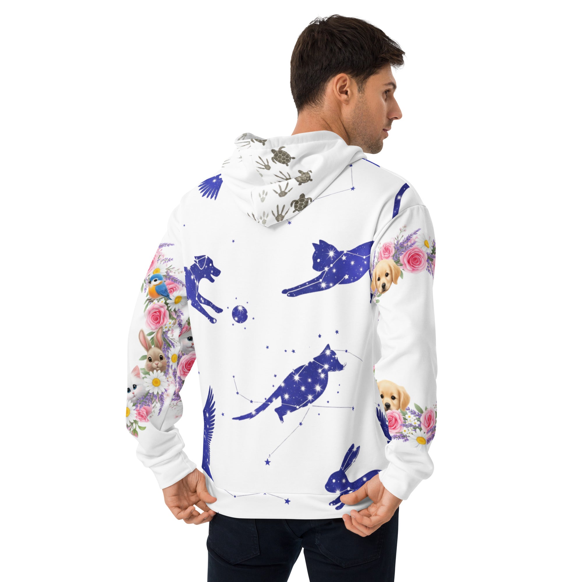 Person wearing a white hoodie with colorful animal designs on a white background