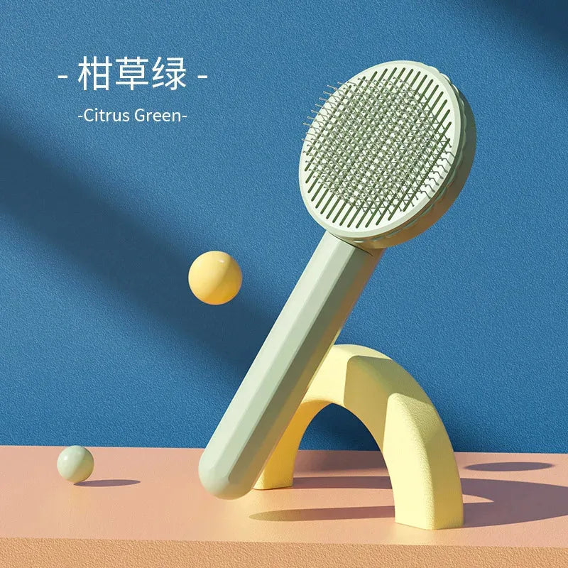 citrus green self-cleaning pet slicker brush displayed on a plain background