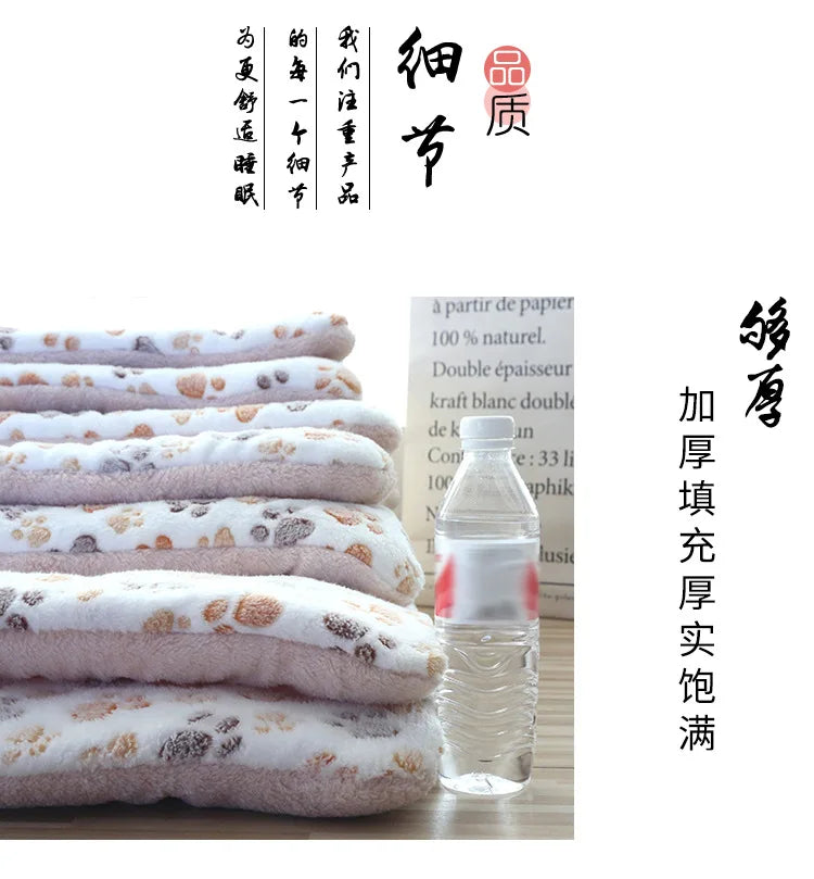 Double-sided pet mats with the same pattern stacked together, arranged from smallest to largest size