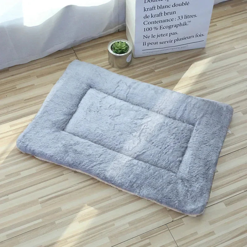 Gray double-sided pet mat displayed on a plain background