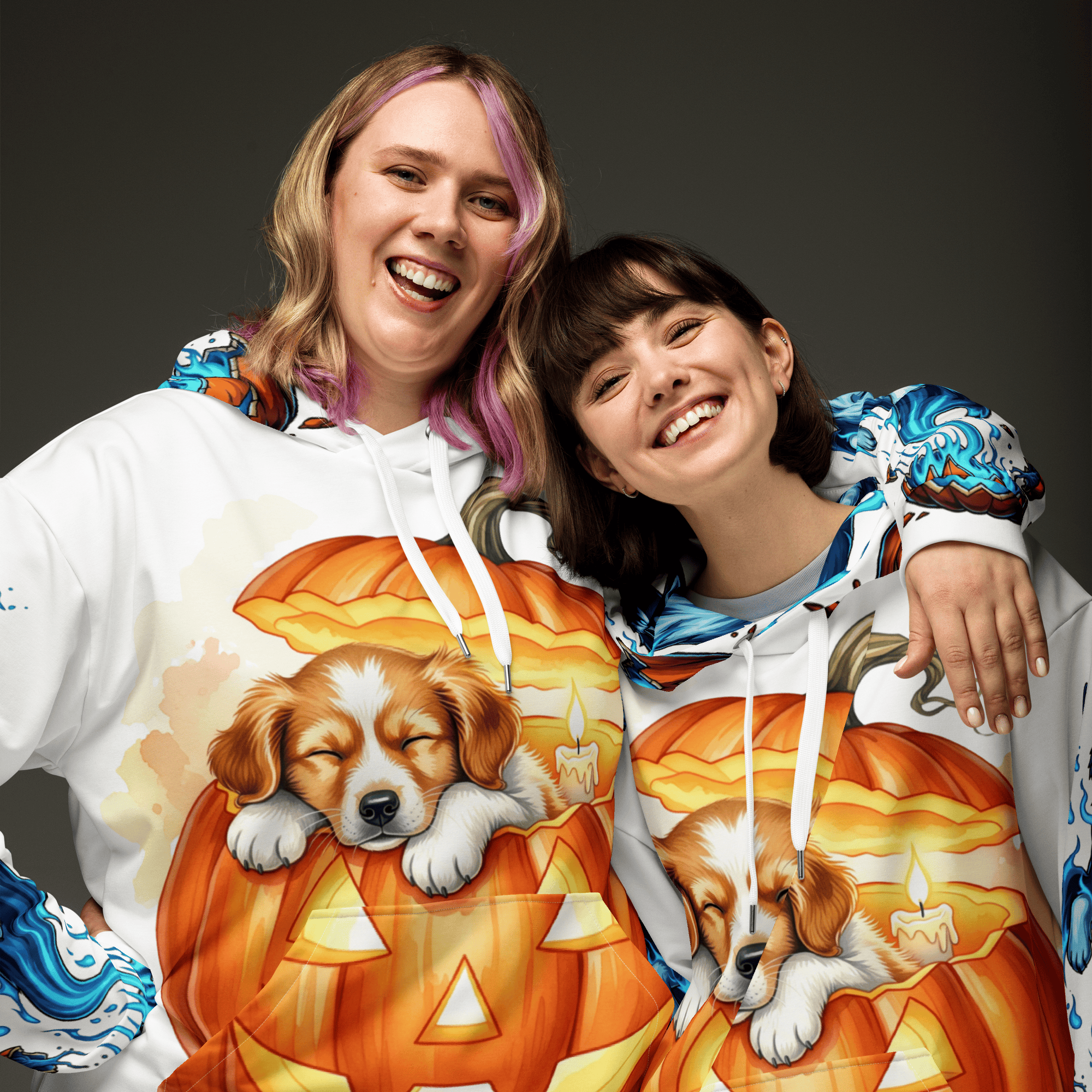 Friends wearing matching Pumpkin Dream Pup Halloween Dog Hoodies – cozy fall pumpkin sweatshirts for pet lovers