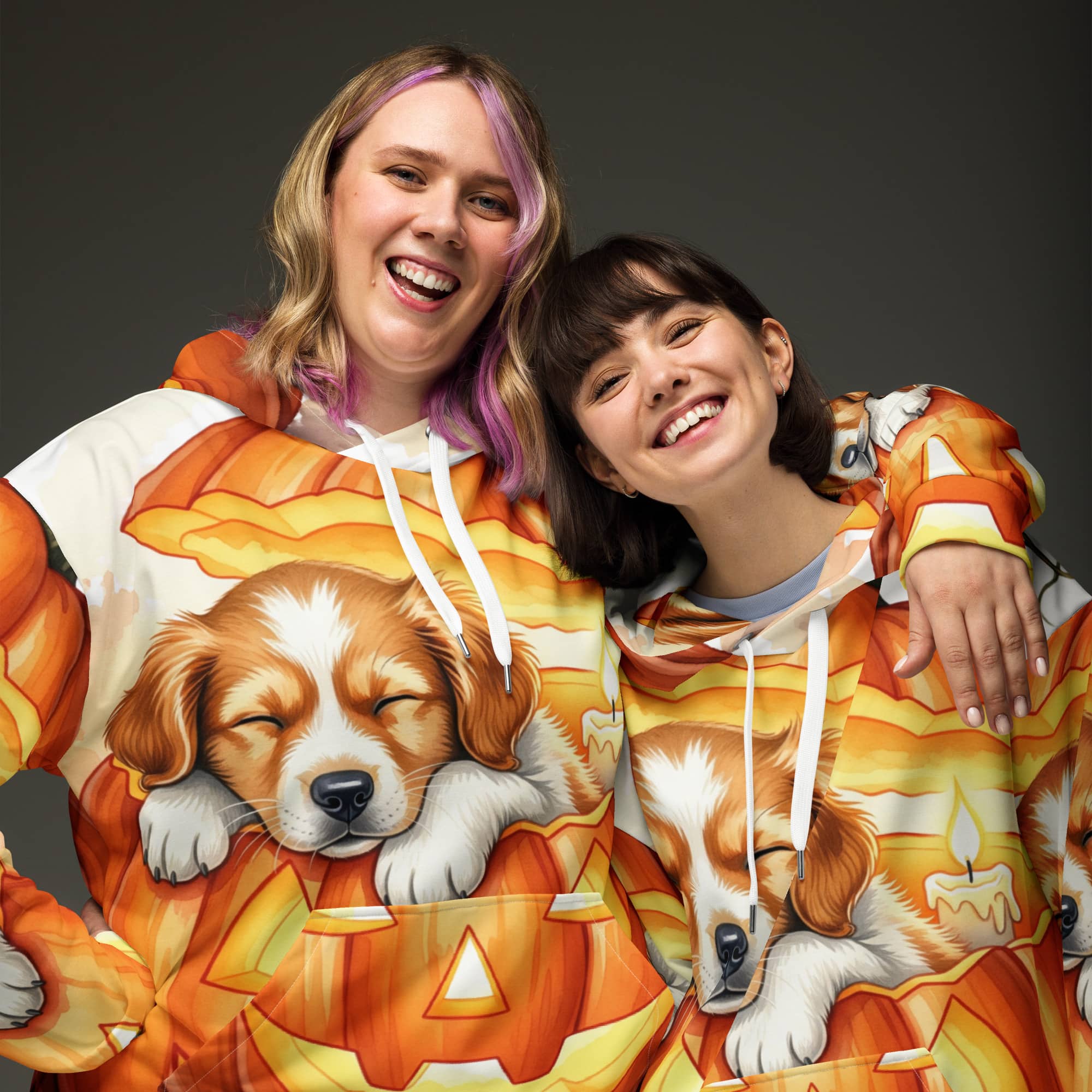 Matching Halloween Pet Hoodies with pumpkin pup design – friends wearing Cozy Pumpkin Pup fall sweatshirts