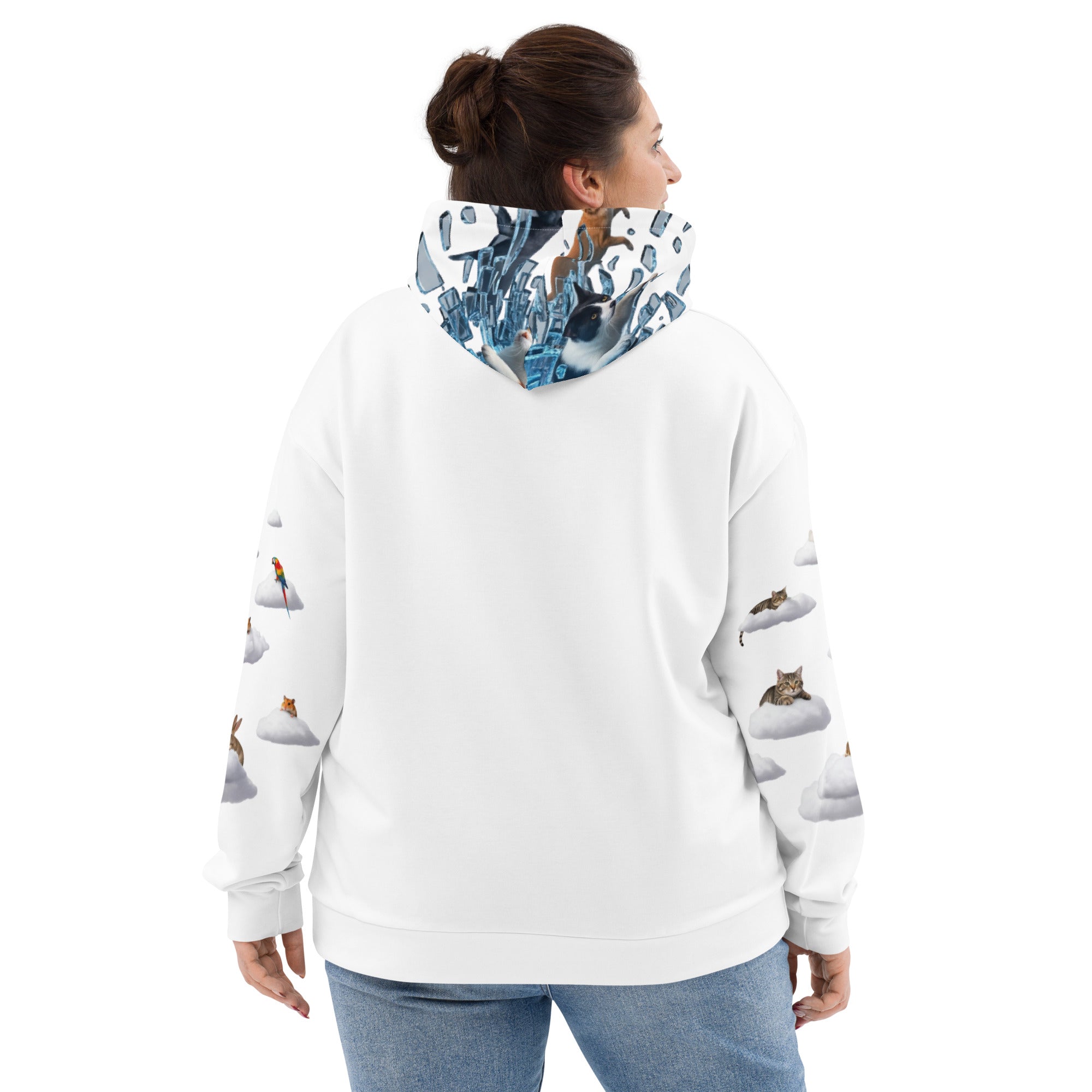 Person wearing a white hoodie with animal prints on the sleeves and back, on a white background